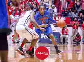 Moody guards Gator who is making faces