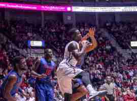 Rhett grabs rebound while three Gators watch