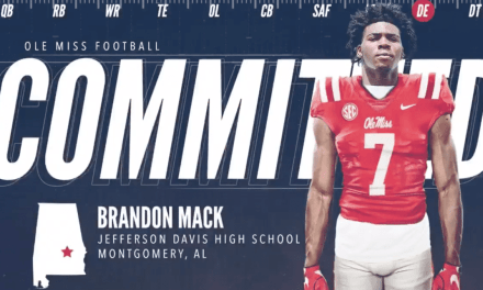 Defensive end Brandon Mack signs with the Rebels